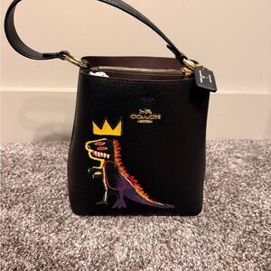 Coach Black Bag with Colorful Dinosaur Accent